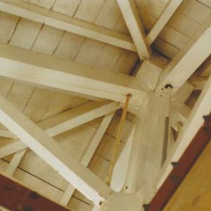View of the wooden structure of the roof